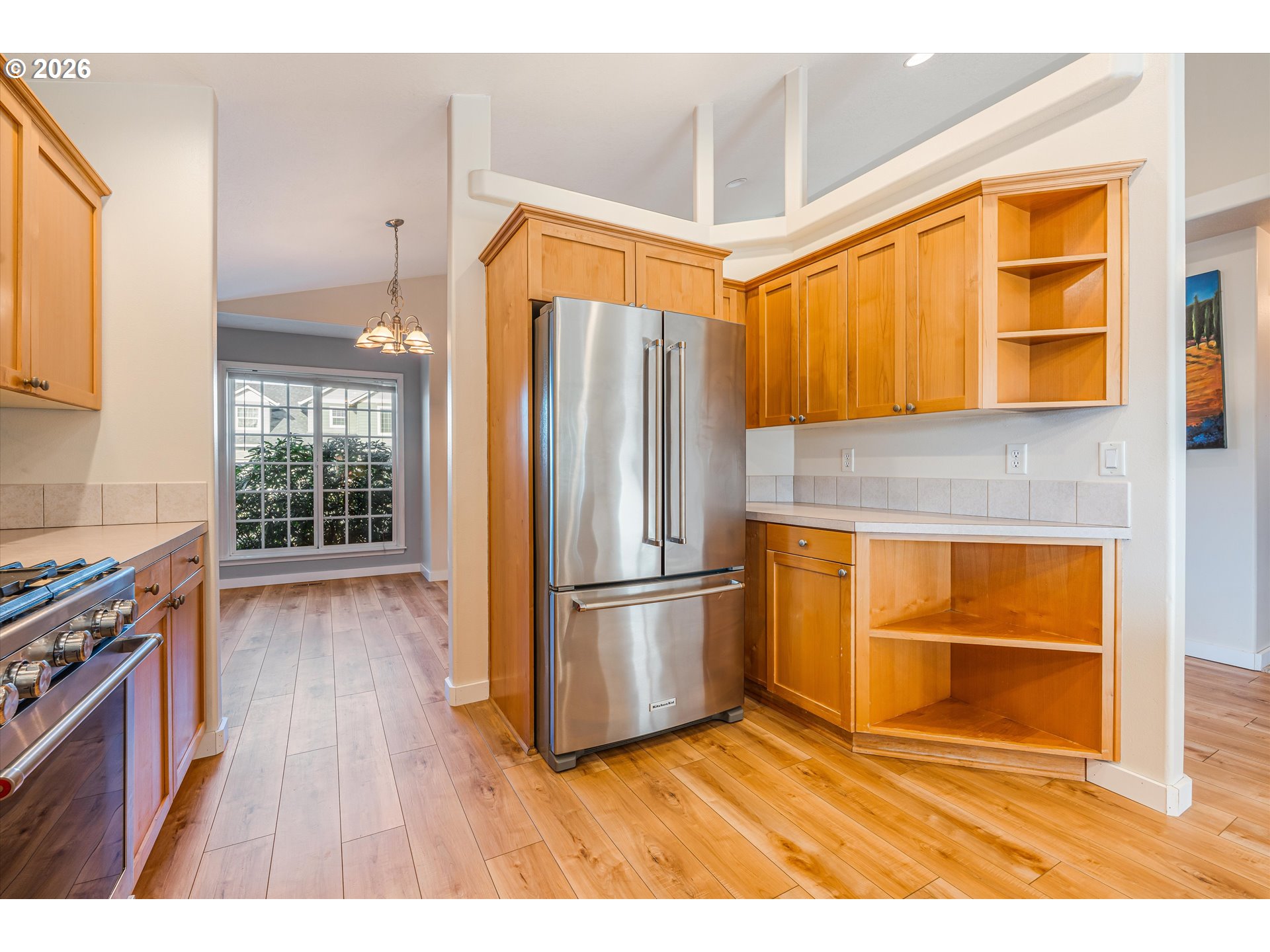 1407 Southeast 7th Avenue Canby, OR 97013 - Photo 10 of 31 a kitchen with stainless steel appliances granite countertop a refrigerator a stove and a sink