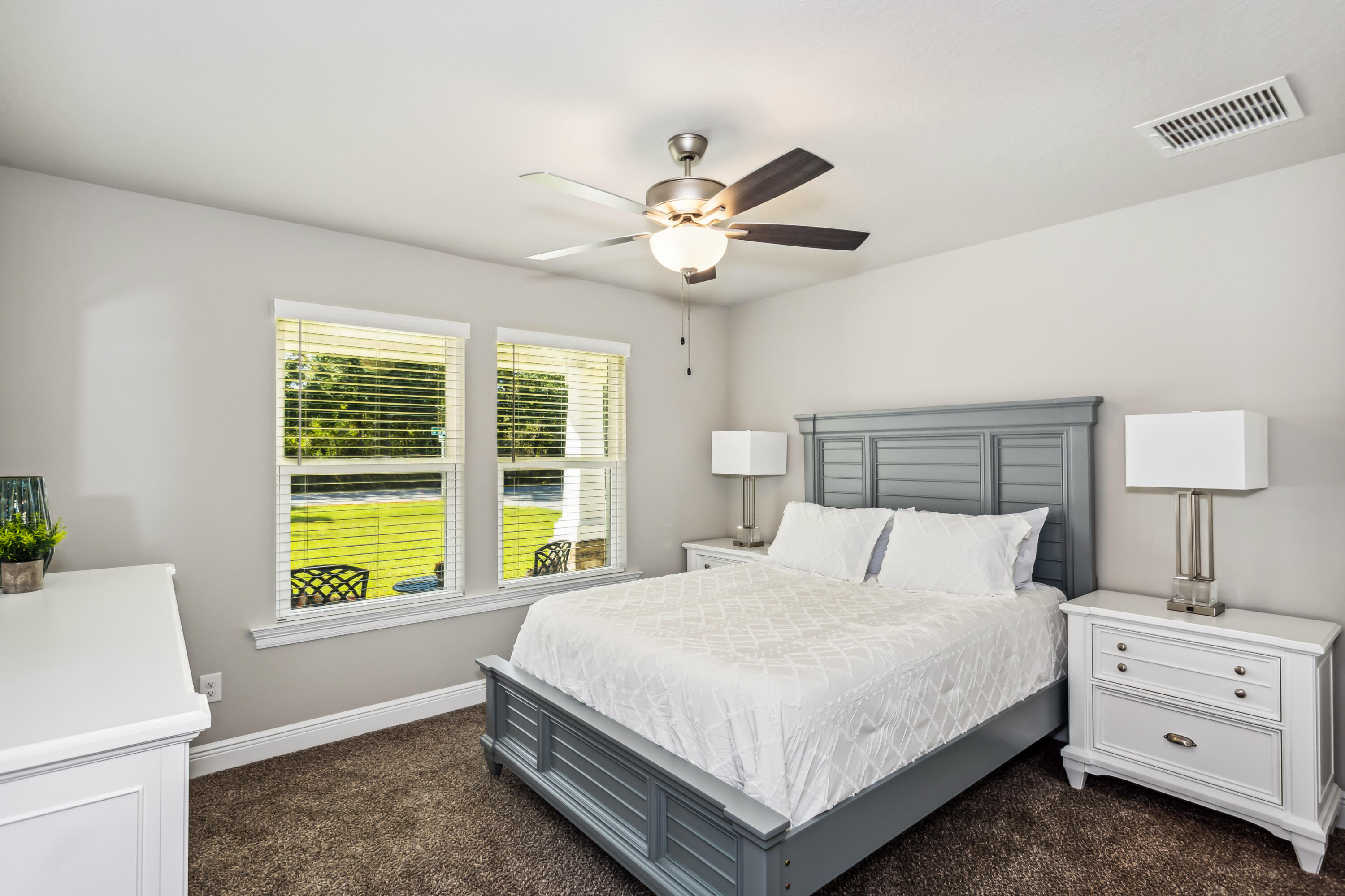 4769 Horace Lunsford Road Milton, FL 32570 - Photo 16 of 21 a bedroom with a bed and a window