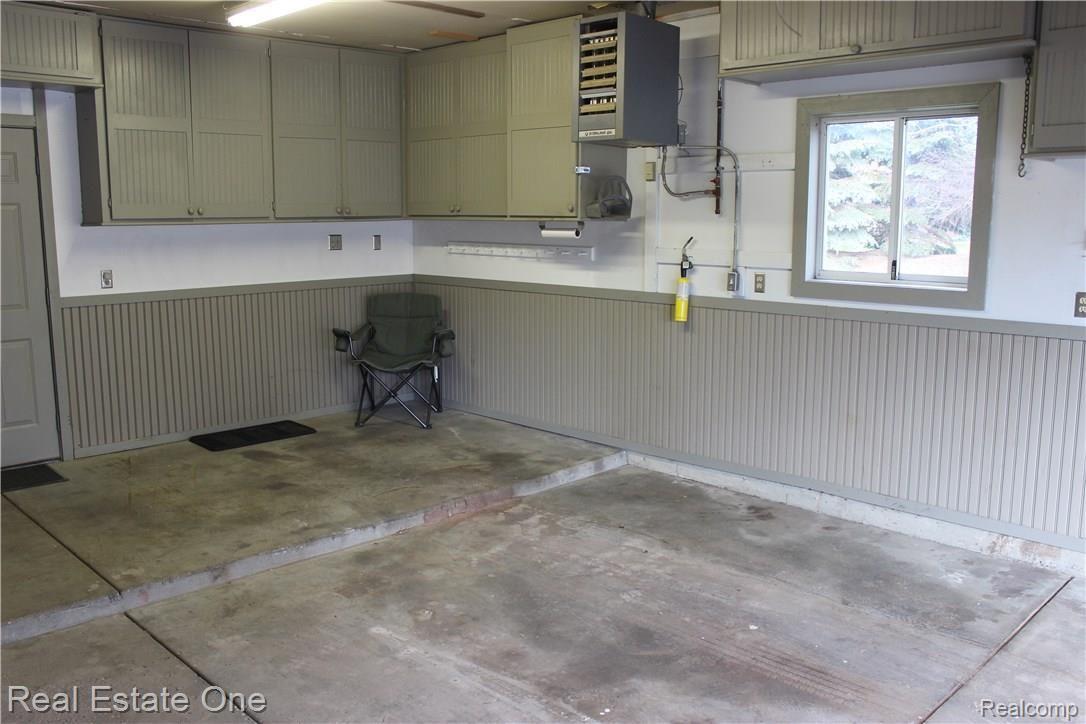 5417 Eagle Road Highland, MI 48356 - Photo 35 of 44 furnace in garage