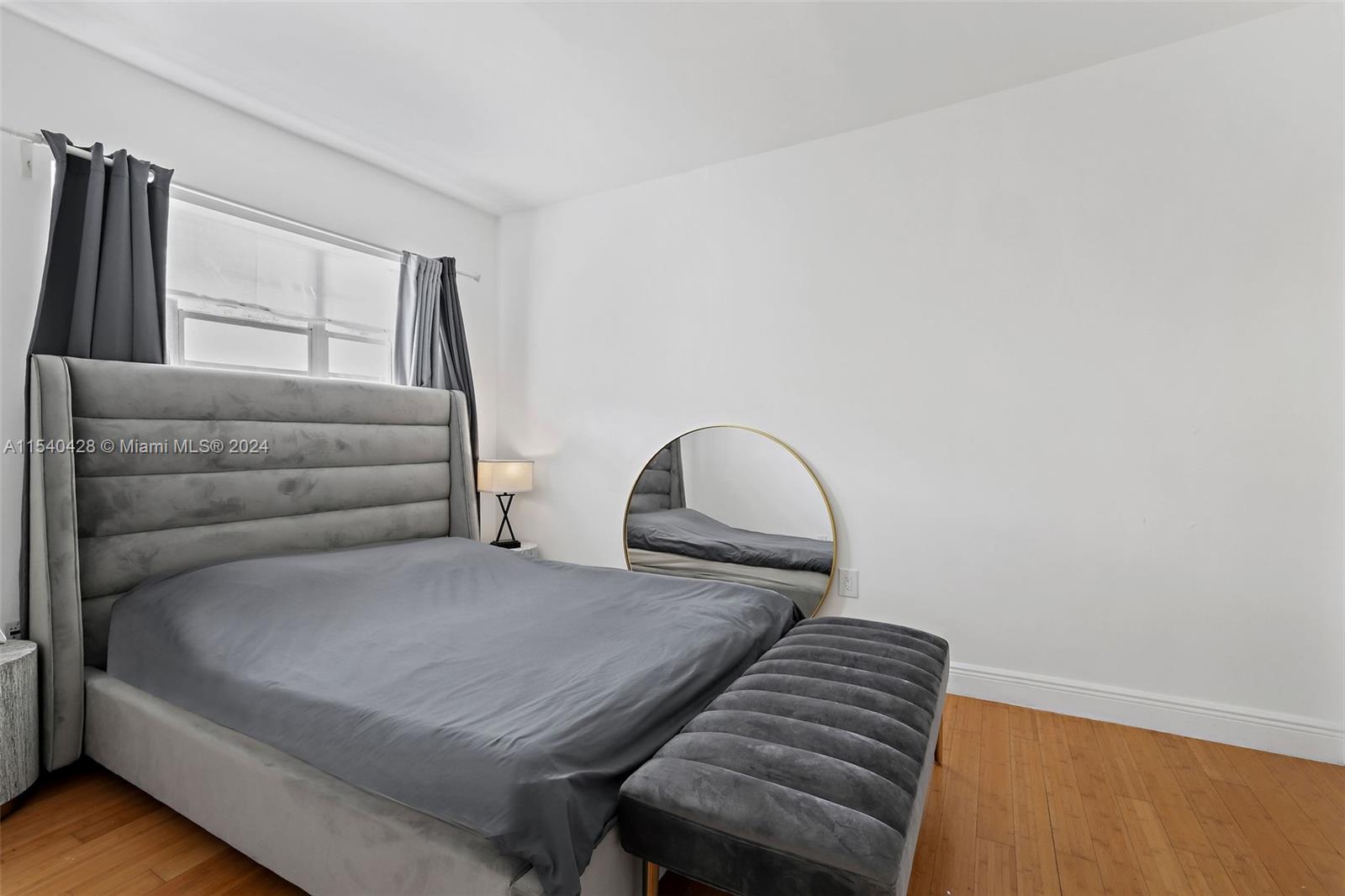 4812 Pine Tree Drive, Unit 207 Miami Beach, FL 33140 - Photo 11 of 23 a view of livingroom with furniture and wooden floor