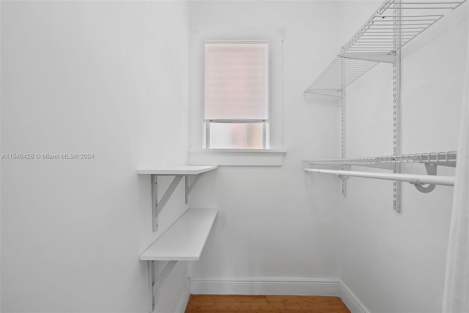 4812 Pine Tree Drive, Unit 207 Miami Beach, FL 33140 - Photo 13 of 23 a view of small space with racks on the wall