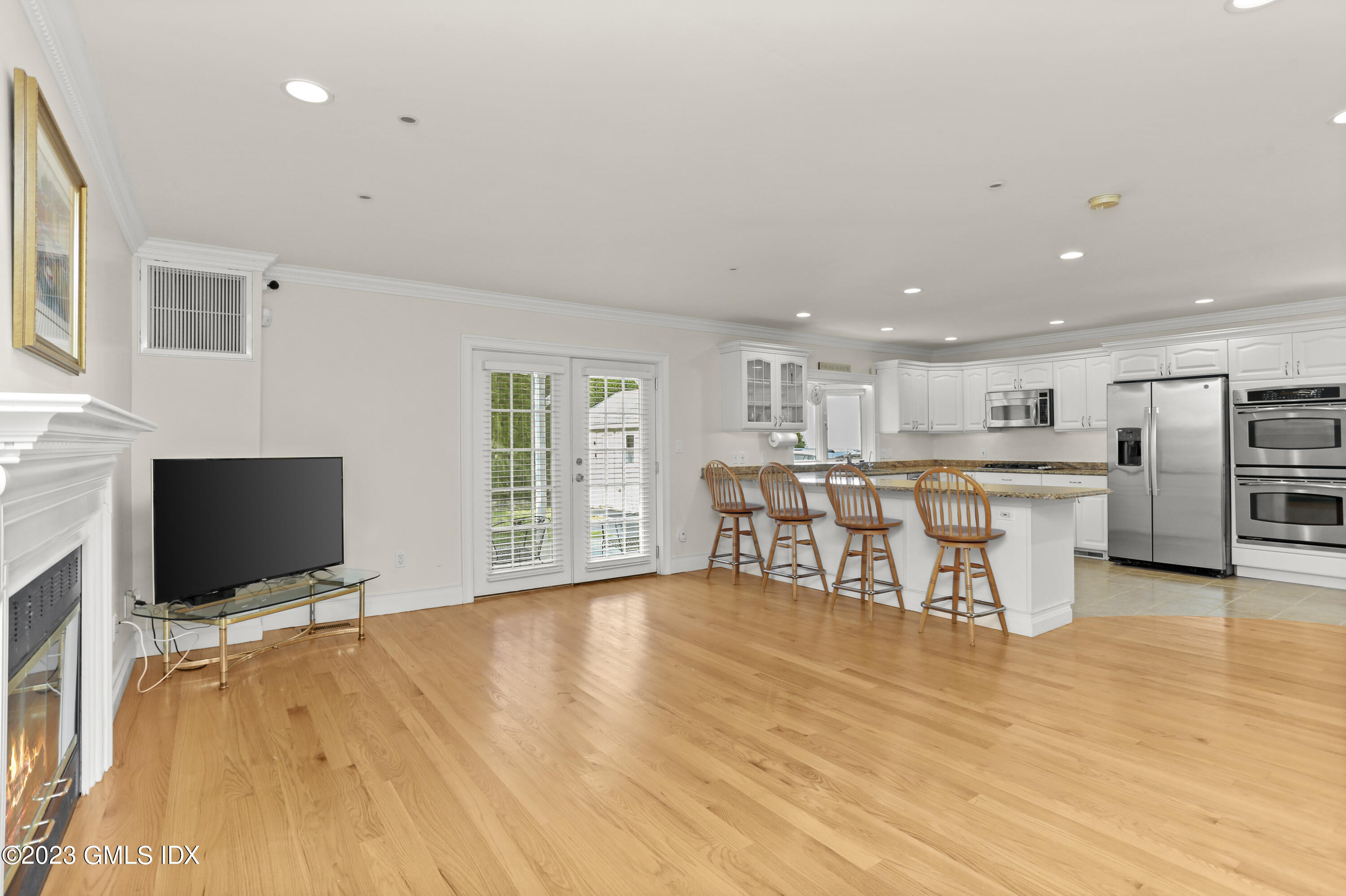 58 Sherwood Place Greenwich, CT 06830 - Photo 12 of 47 a view of a kitchen with furniture and wooden floor