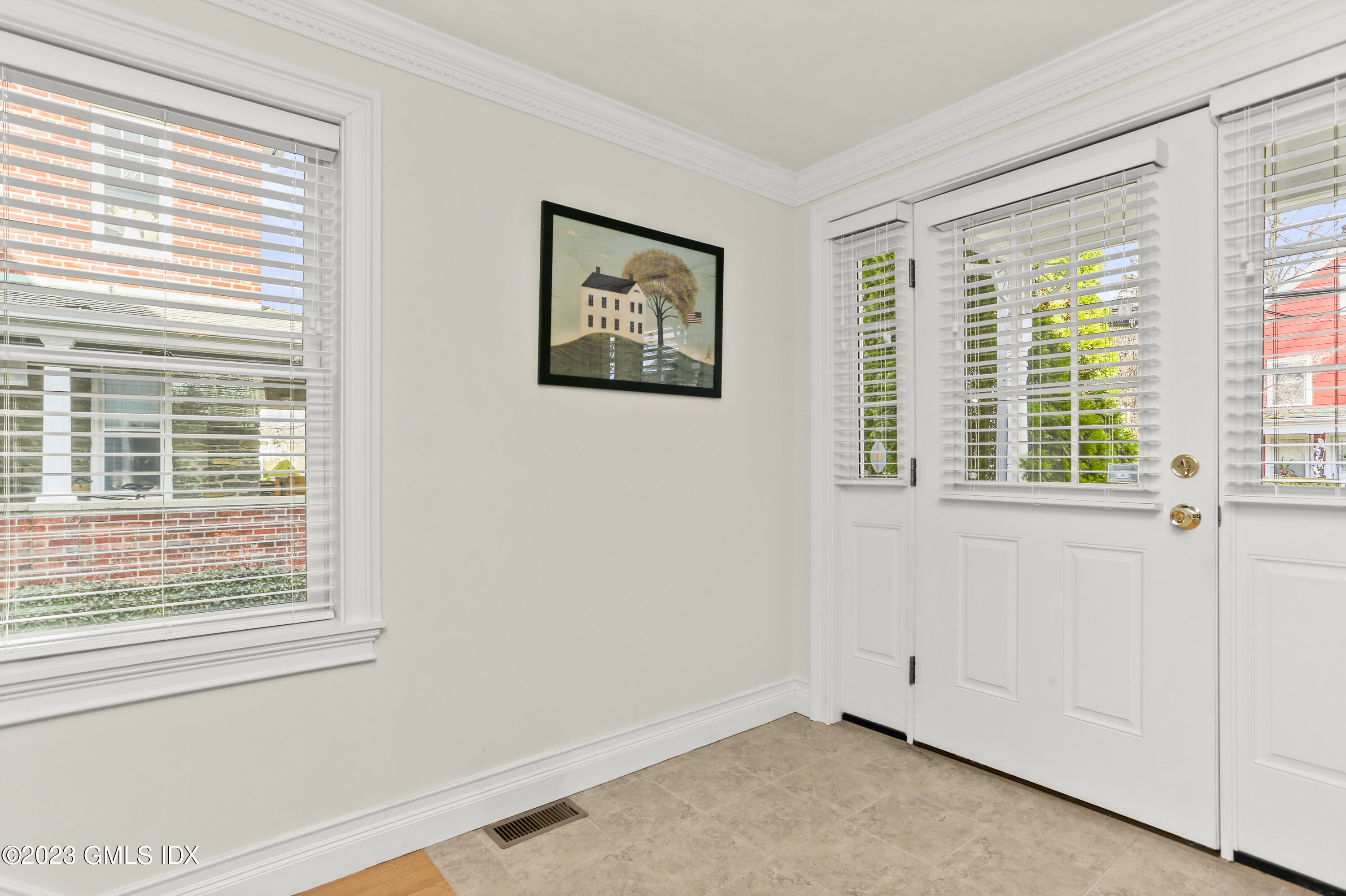 58 Sherwood Place Greenwich, CT 06830 - Photo 15 of 47 a view of a bedroom with a large window