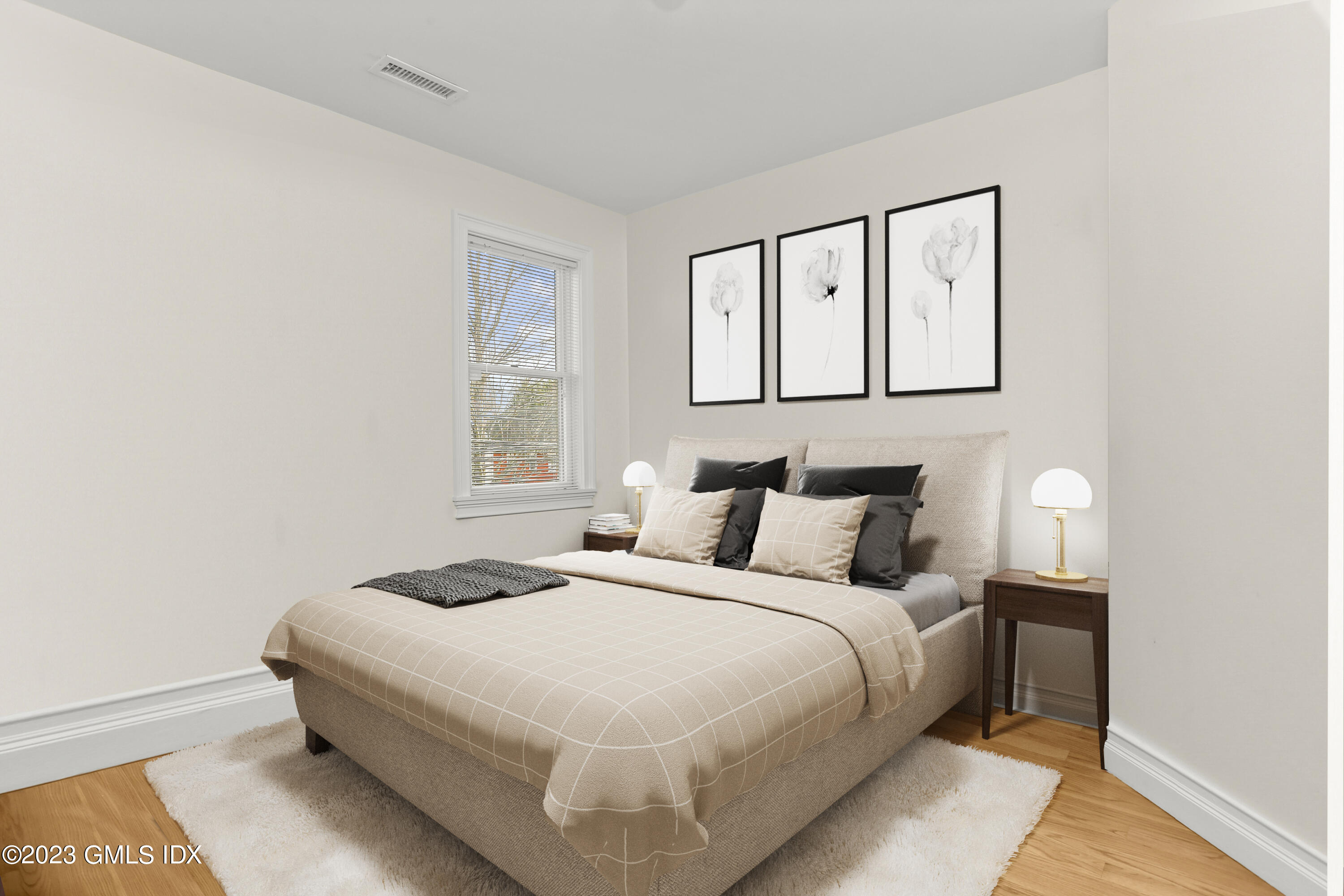 58 Sherwood Place Greenwich, CT 06830 - Photo 22 of 47 a bedroom with a bed and a window