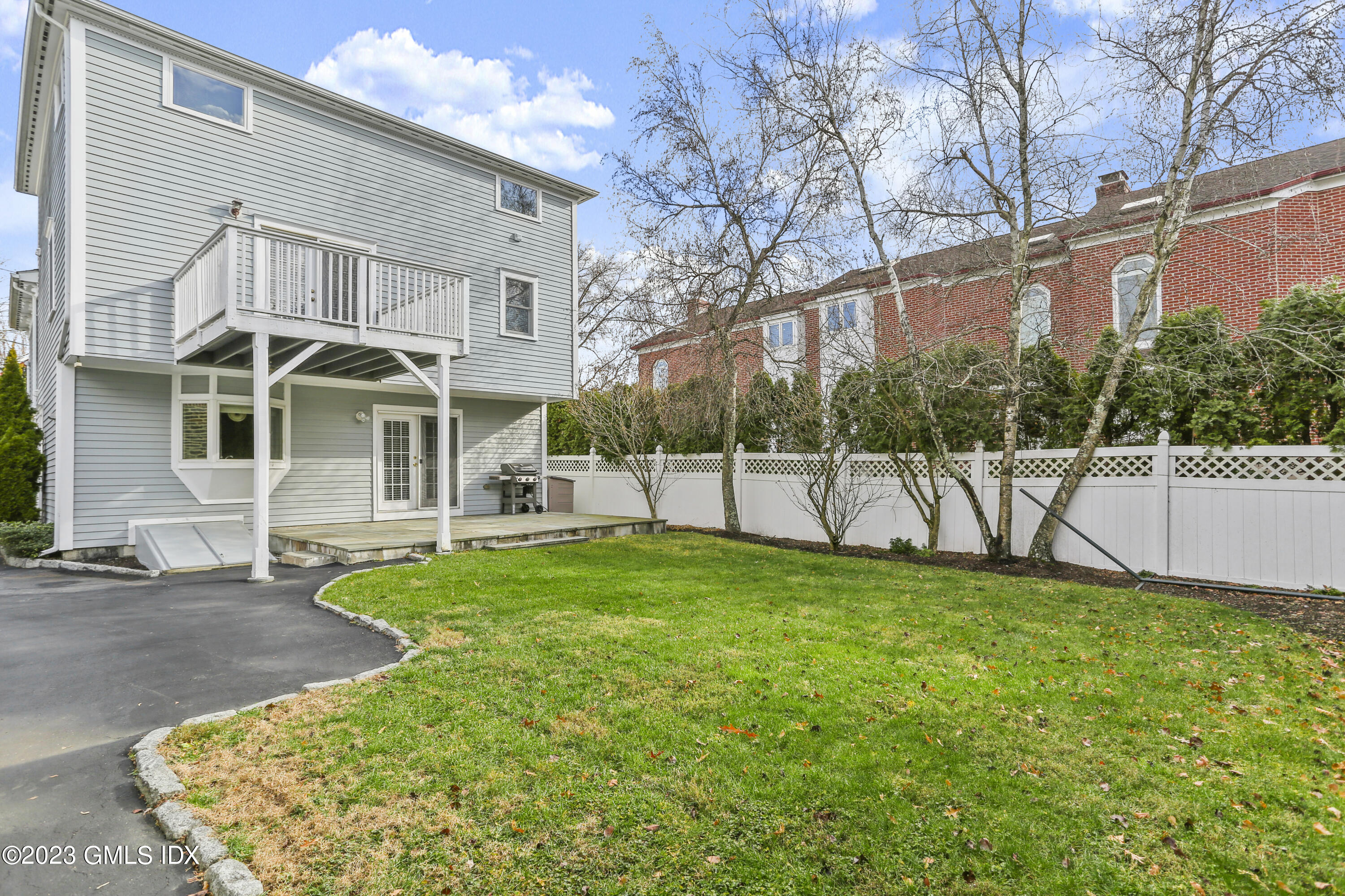 58 Sherwood Place Greenwich, CT 06830 - Photo 36 of 47 a view of a house with backyard