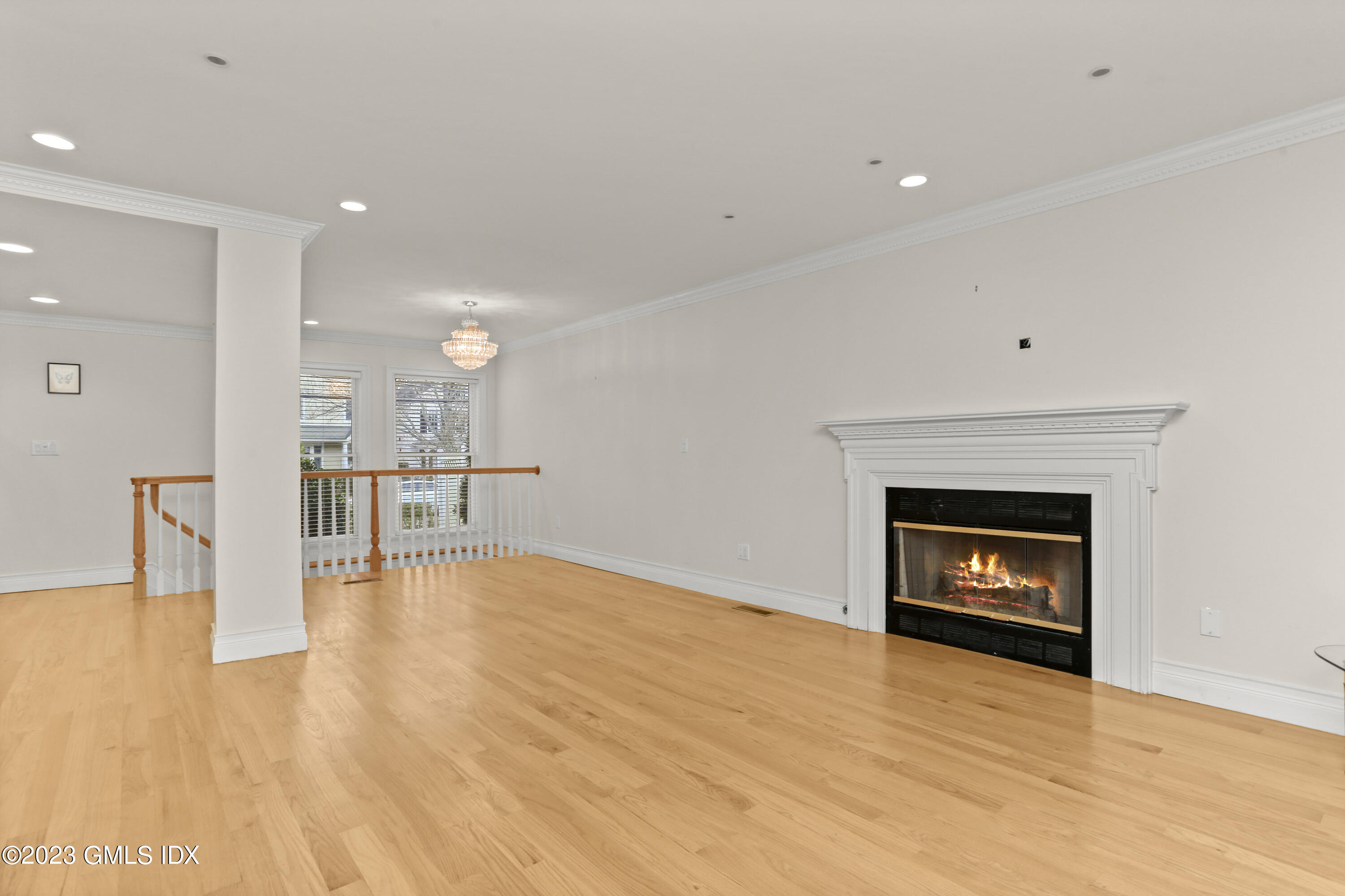 58 Sherwood Place Greenwich, CT 06830 - Photo 6 of 47 a view of an empty room with a fireplace
