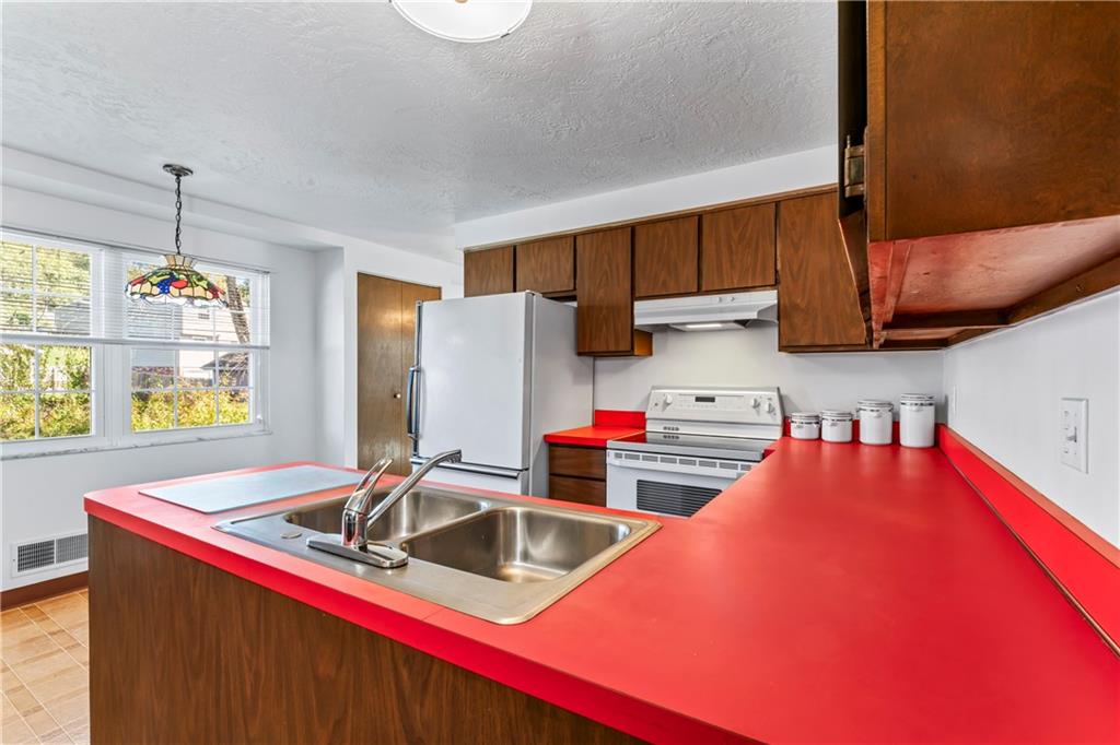 133 Tory Road Coraopolis, PA 15108 - Photo 25 of 48 a kitchen that has a sink cabinets and window