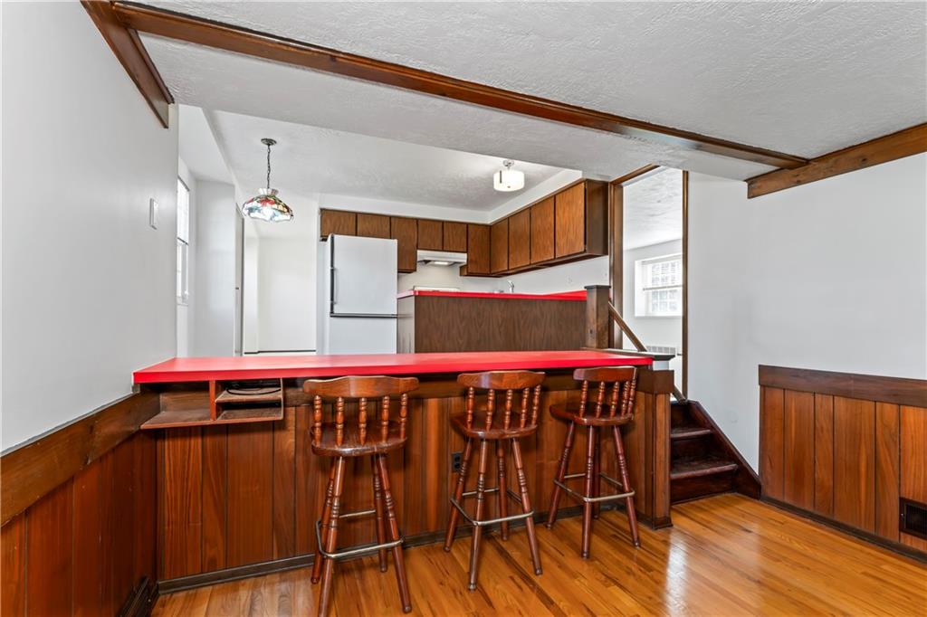 133 Tory Road Coraopolis, PA 15108 - Photo 26 of 48 a bedroom with a bed and wooden floor