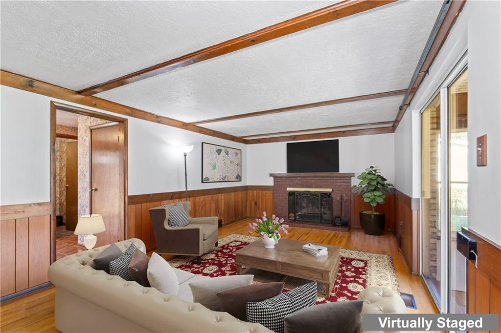 133 Tory Road Coraopolis, PA 15108 - Photo 28 of 48 a living room with furniture and a fireplace