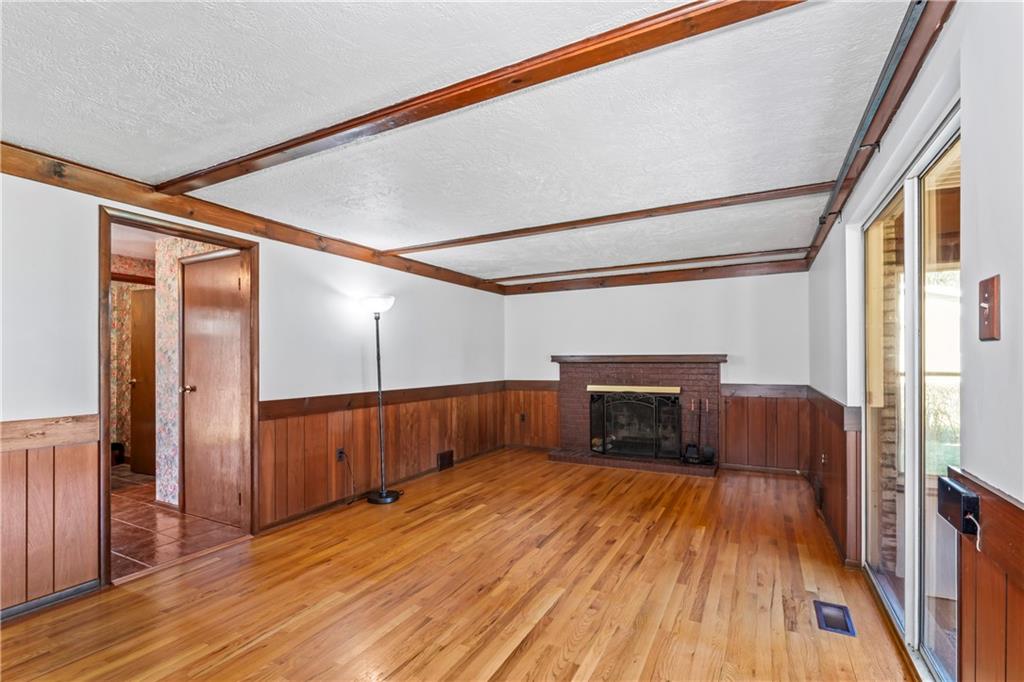 133 Tory Road Coraopolis, PA 15108 - Photo 29 of 48 a view of front door with hallway and wooden floor