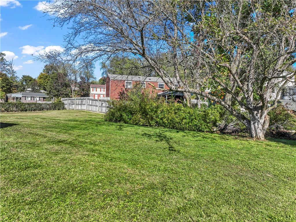 133 Tory Road Coraopolis, PA 15108 - Photo 7 of 48 a backyard of a house with lots of green space