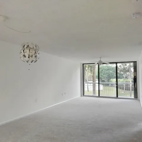 an empty room with a large window