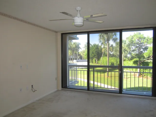 a view of an empty room with a large window