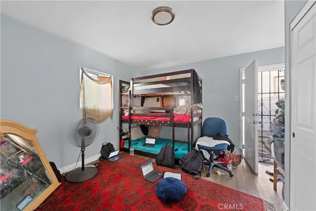 a room with toys and a wooden floor