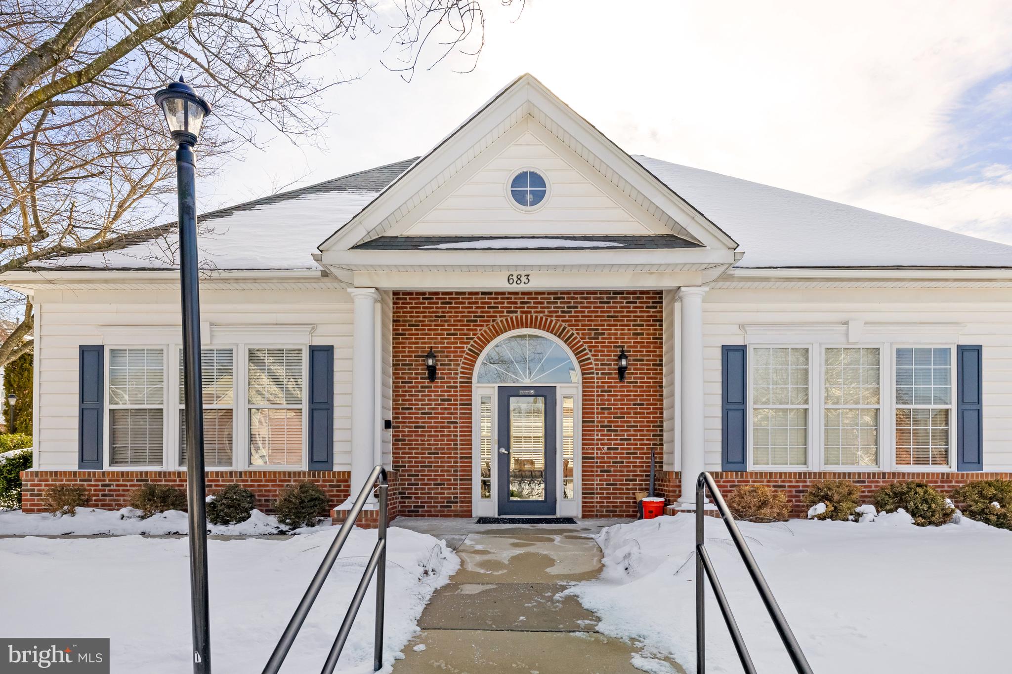 521 Constellation Square Southeast, Unit J Leesburg, VA 20175 - Photo 34 of 37 a front view of a house with glass windows