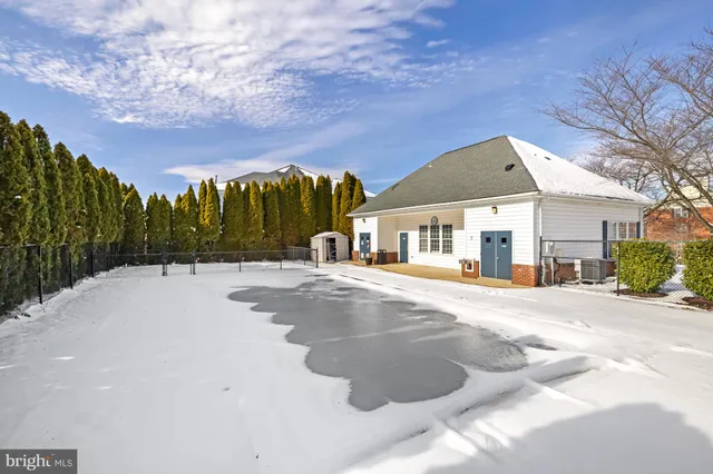 a front view of a house with glass windows