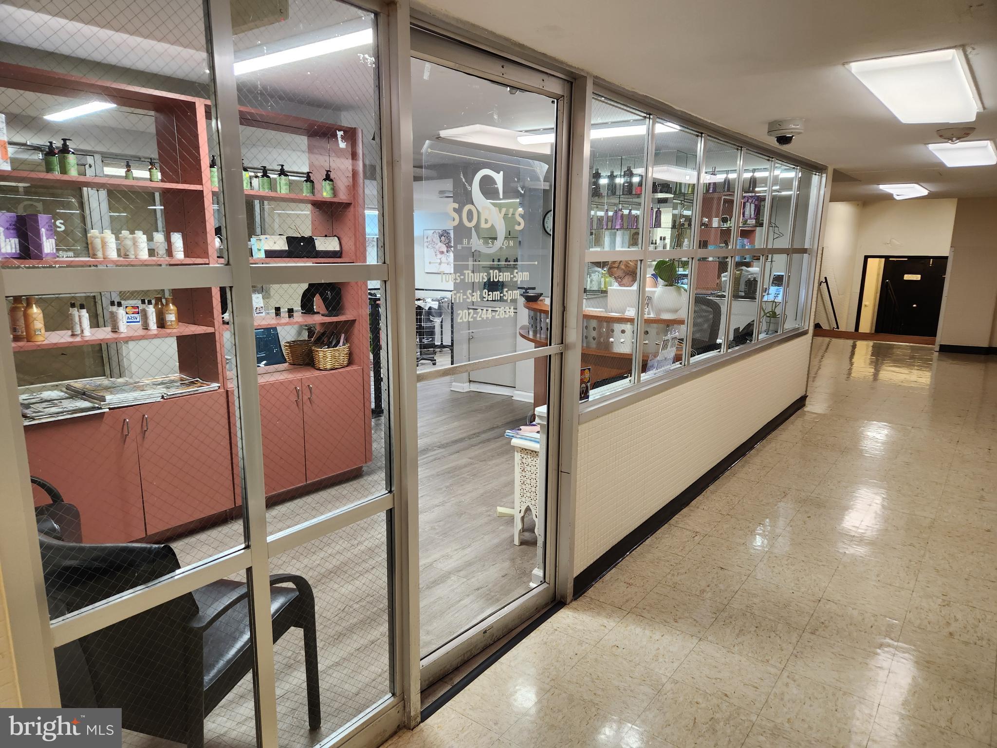 4201 Cathedral Avenue Northwest, Unit 1012E Washington, DC 20016 - Photo 13 of 18 a view of a room with shelves