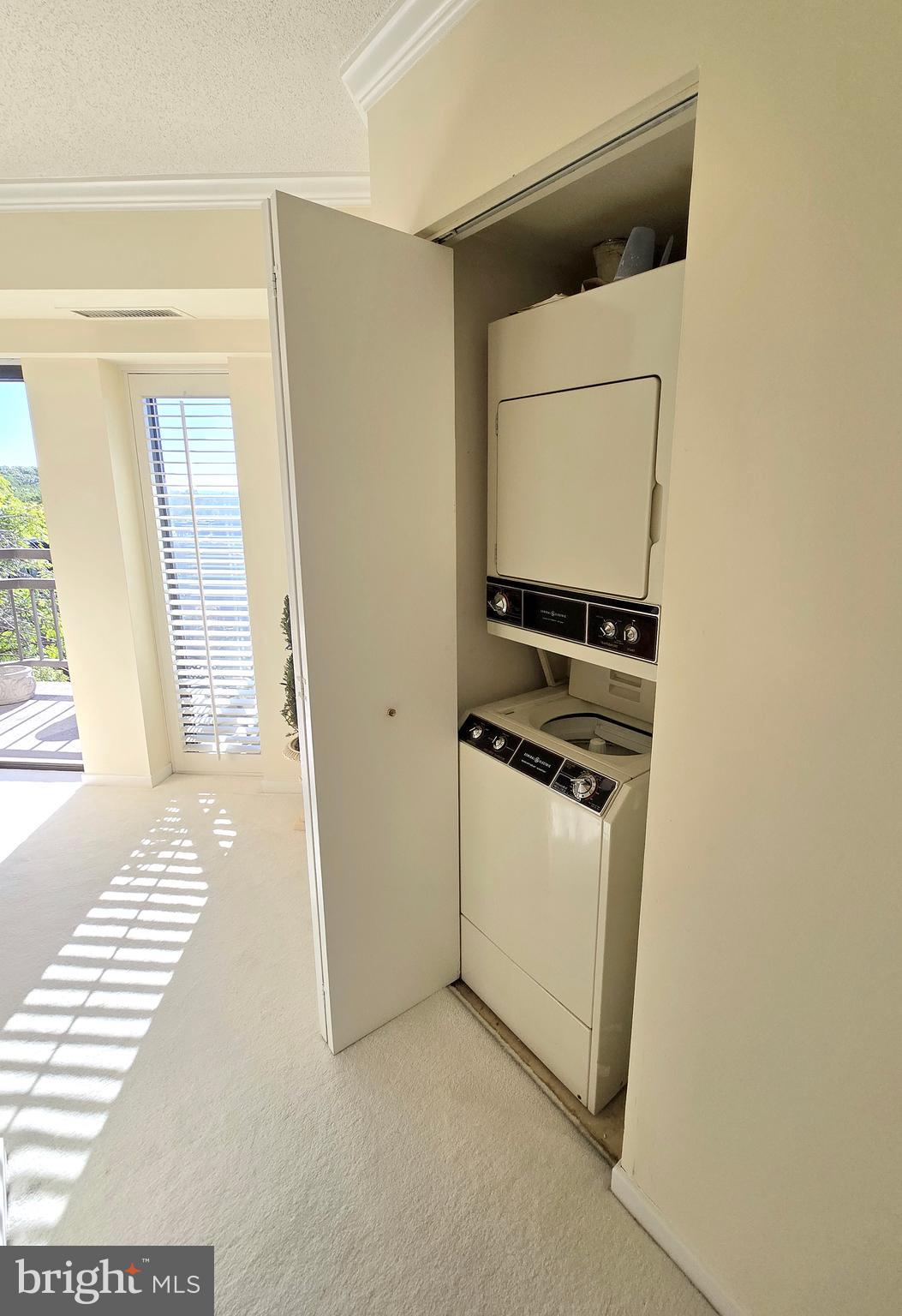 2111 Wisconsin Avenue Northwest, Unit 401 Washington, DC 20007 - Photo 13 of 16 a view of kitchen and utility room