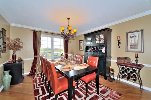 3N684 Ridgeview Court St. Charles, IL 60175 - Photo 3 of 16 a view of a dining room with furniture window and wooden floor