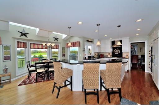 3N684 Ridgeview Court St. Charles, IL 60175 - Photo 5 of 16 a dining area with furniture a rug and wooden floor