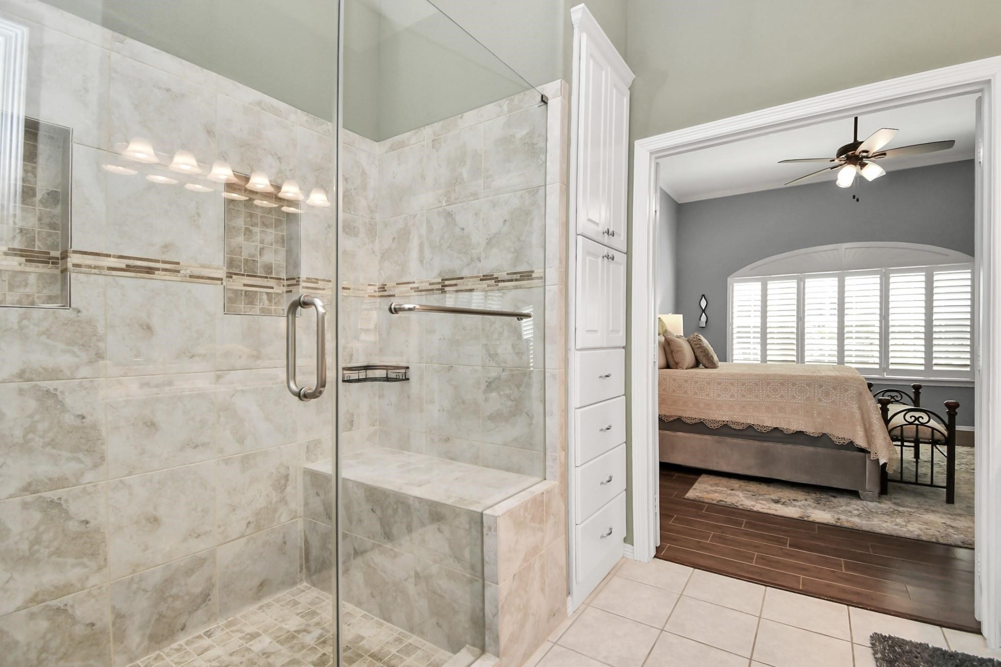 8624 Sunset Loch Drive Spring, TX 77379 - Photo 23 of 44 a spacious bathroom with a balcony a sink and shower