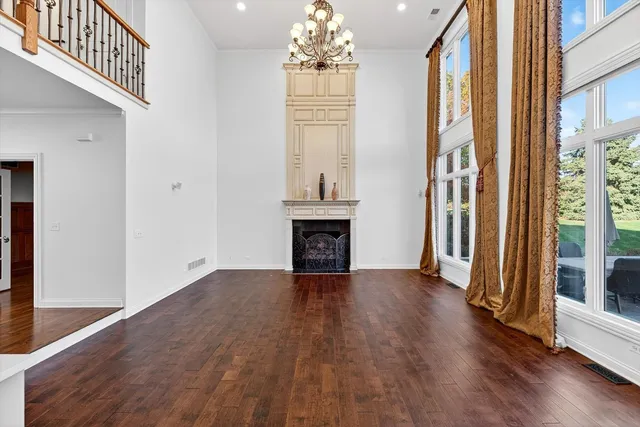 a view of kitchen with wooden floor and window