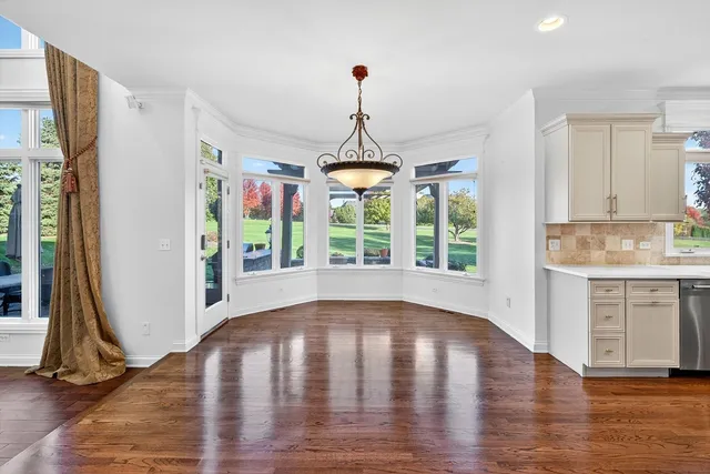 a kitchen with a stove and a microwave