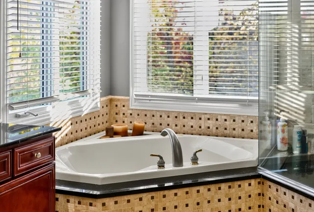 a bathroom with a sink and a shower