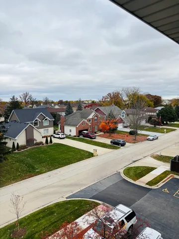 a view of a street with houses