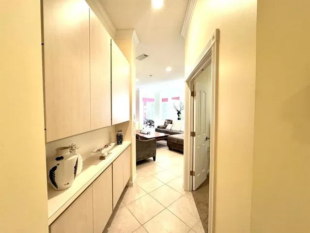 a bathroom with a tub sink and shower