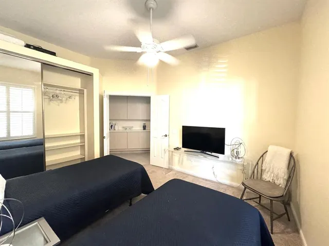 a room with a sink and cabinets