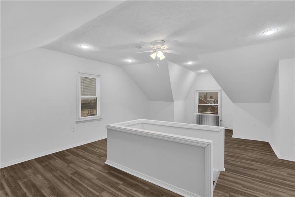 1841 Chislett Street Pittsburgh, PA 15206 - Photo 22 of 28 a view of a hallway with entryway and wooden floor