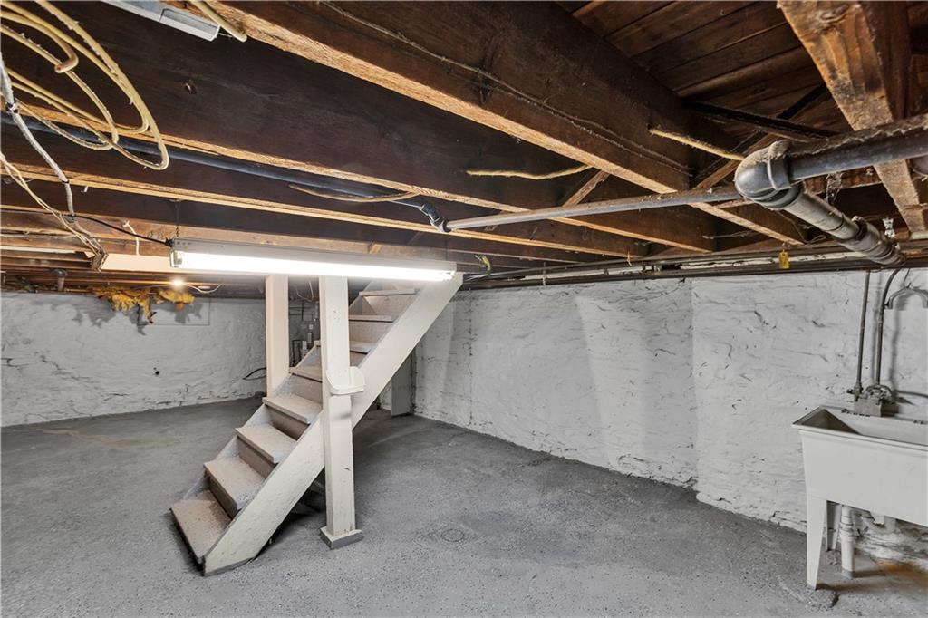 1841 Chislett Street Pittsburgh, PA 15206 - Photo 24 of 28 a view of an empty room with stairs