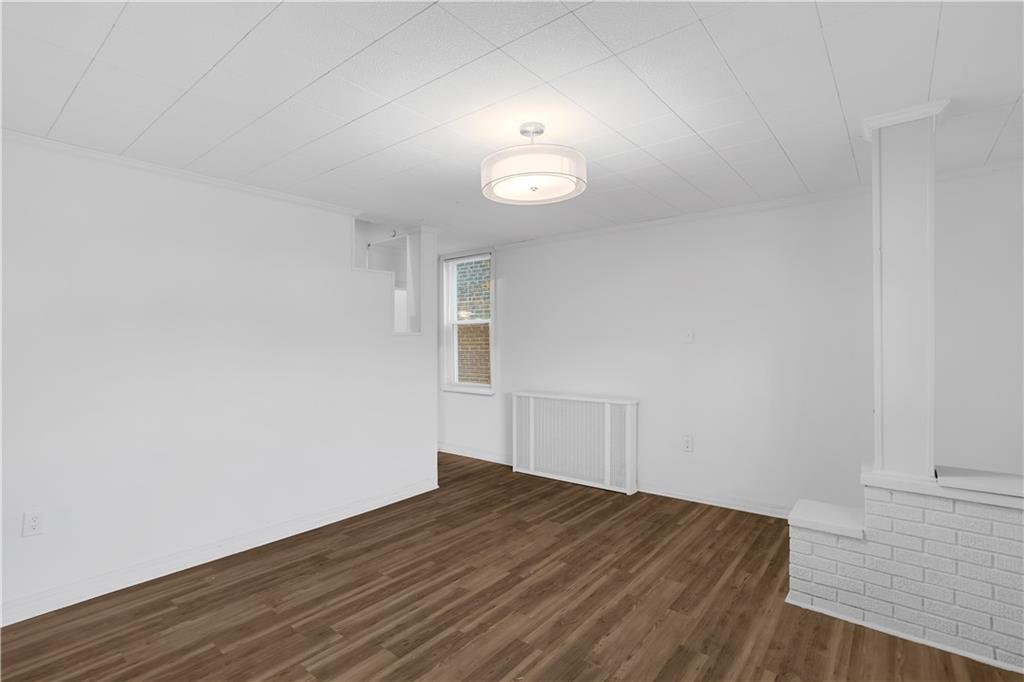 1841 Chislett Street Pittsburgh, PA 15206 - Photo 8 of 28 a view of empty room with wooden floor