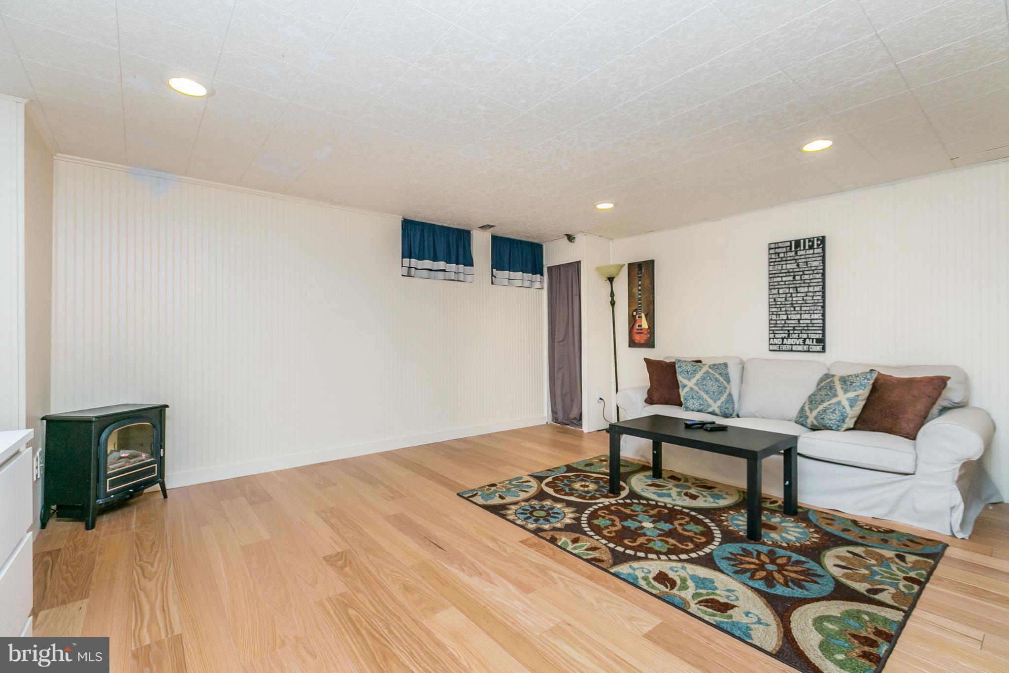 6430 Blenheim Road Baltimore, MD 21212 - Photo 21 of 30 Finished Lower Level w/New Flooring