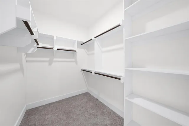 a view of an empty walk in closet