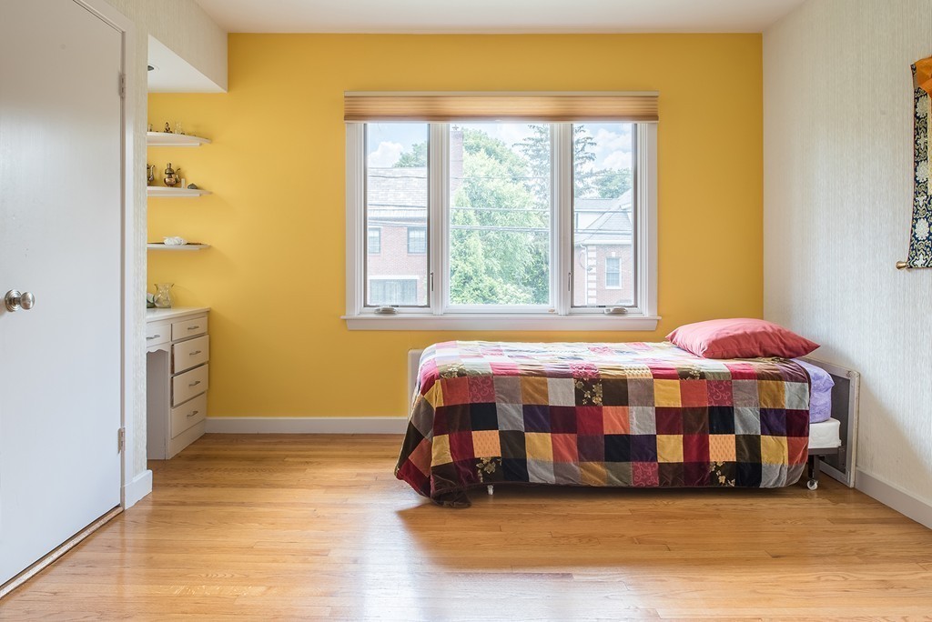 39 Clements Road Newton, MA 02458 - Photo 6 of 11 a bedroom with a bed and a window