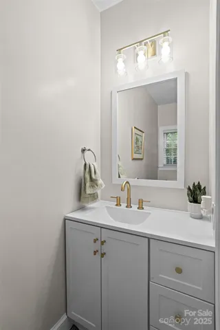 a spacious bedroom with a bed and a window