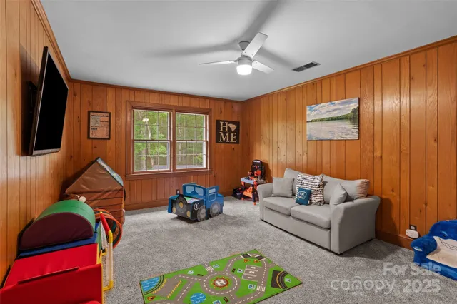 a view of a garden with an outdoor seating