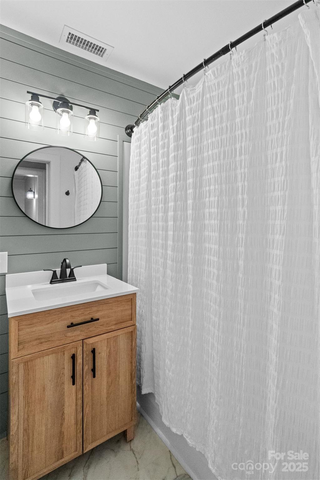 2520 Wooten Road Chester, SC 29706 - Photo 24 of 48 a bathroom with a granite countertop sink and a mirror