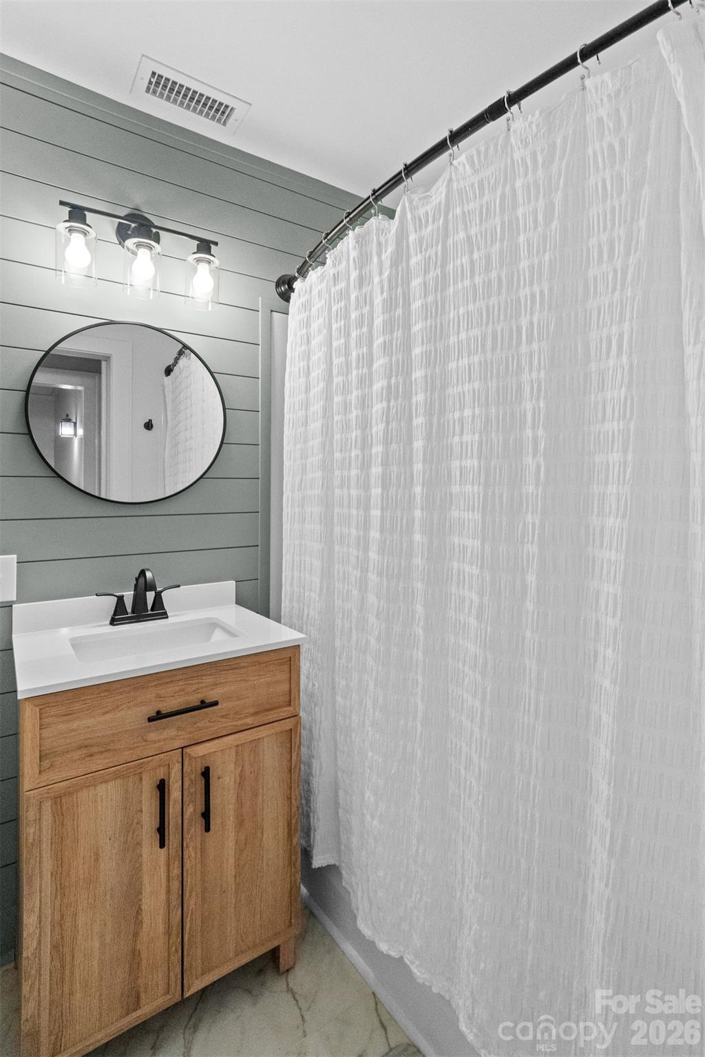 2520 Wooten Road Chester, SC 29706 - Photo 25 of 48 a bathroom with a granite countertop sink and a mirror