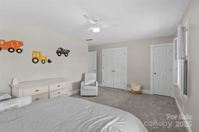 a view of a house with backyard porch and sitting area