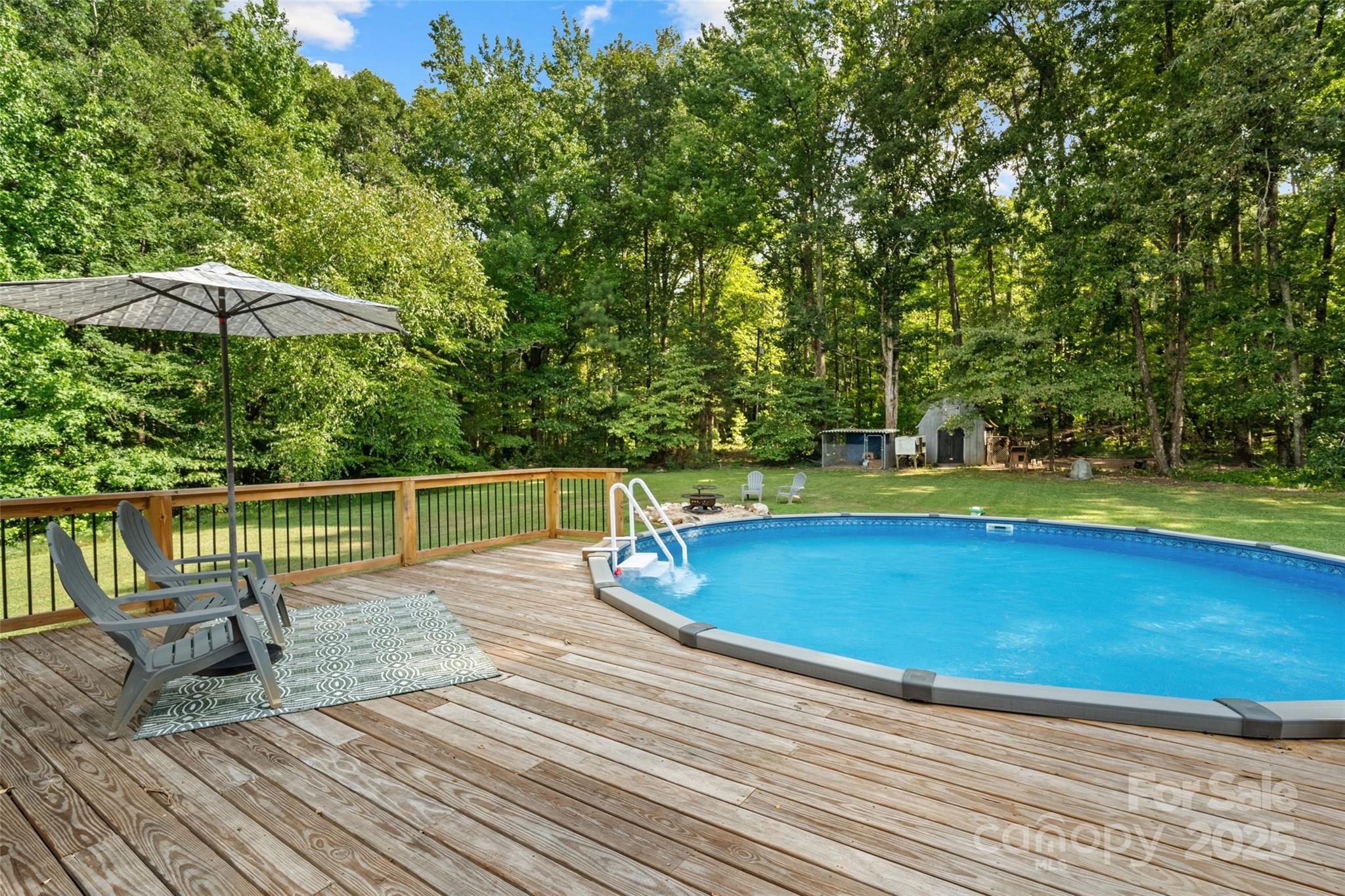 2520 Wooten Road Chester, SC 29706 - Photo 35 of 48 a view of a swimming pool with a patio and a garden
