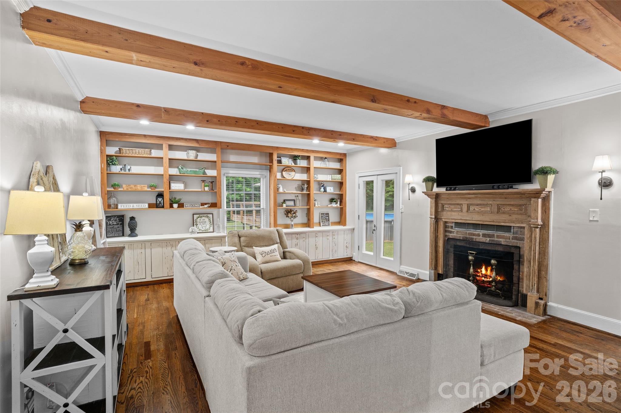 2520 Wooten Road Chester, SC 29706 - Photo 8 of 48 a living room with furniture a flat screen tv and a fireplace