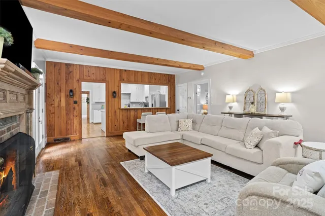 a view of a dining room with furniture and window