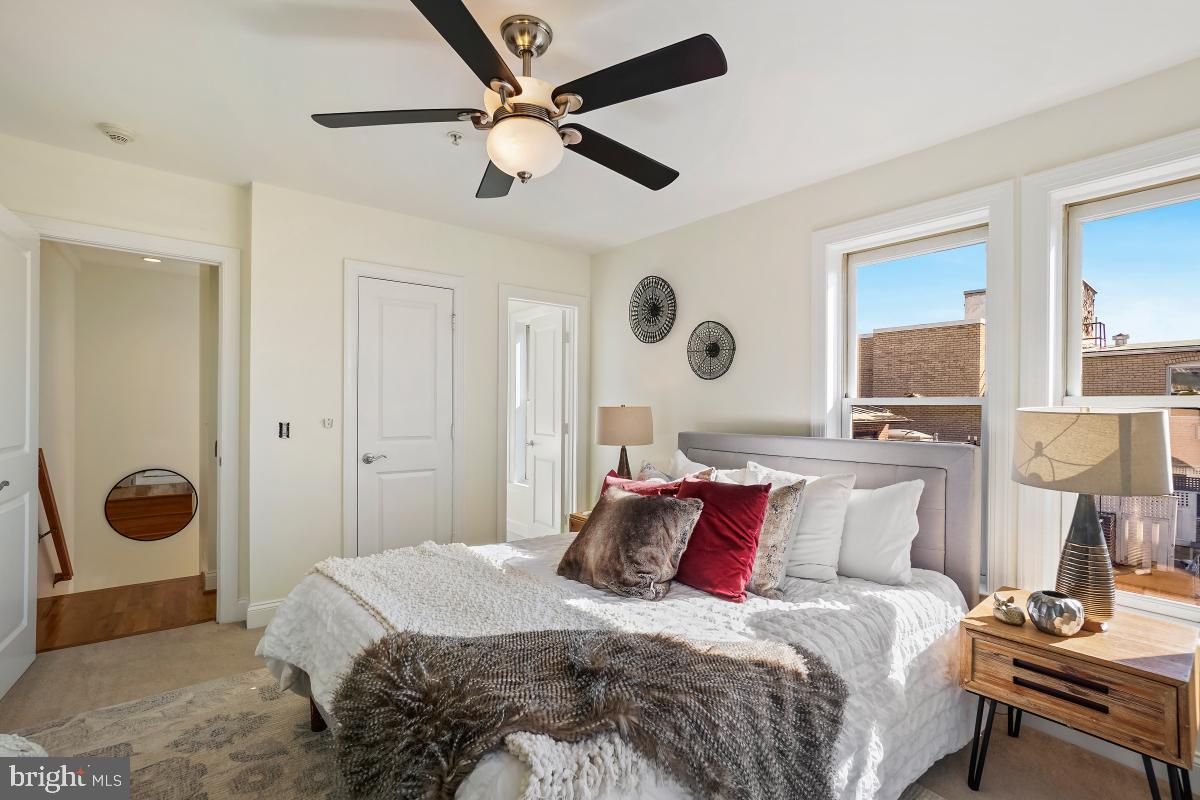 1832 Swann Street Northwest, Unit D Washington, DC 20009 - Photo 15 of 29 a bedroom with a bed and a window
