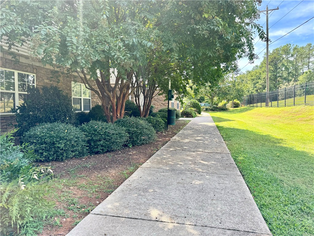 335 Lookover Drive Anderson, SC 29621 - Photo 23 of 33 The walkway at the rear of the building
