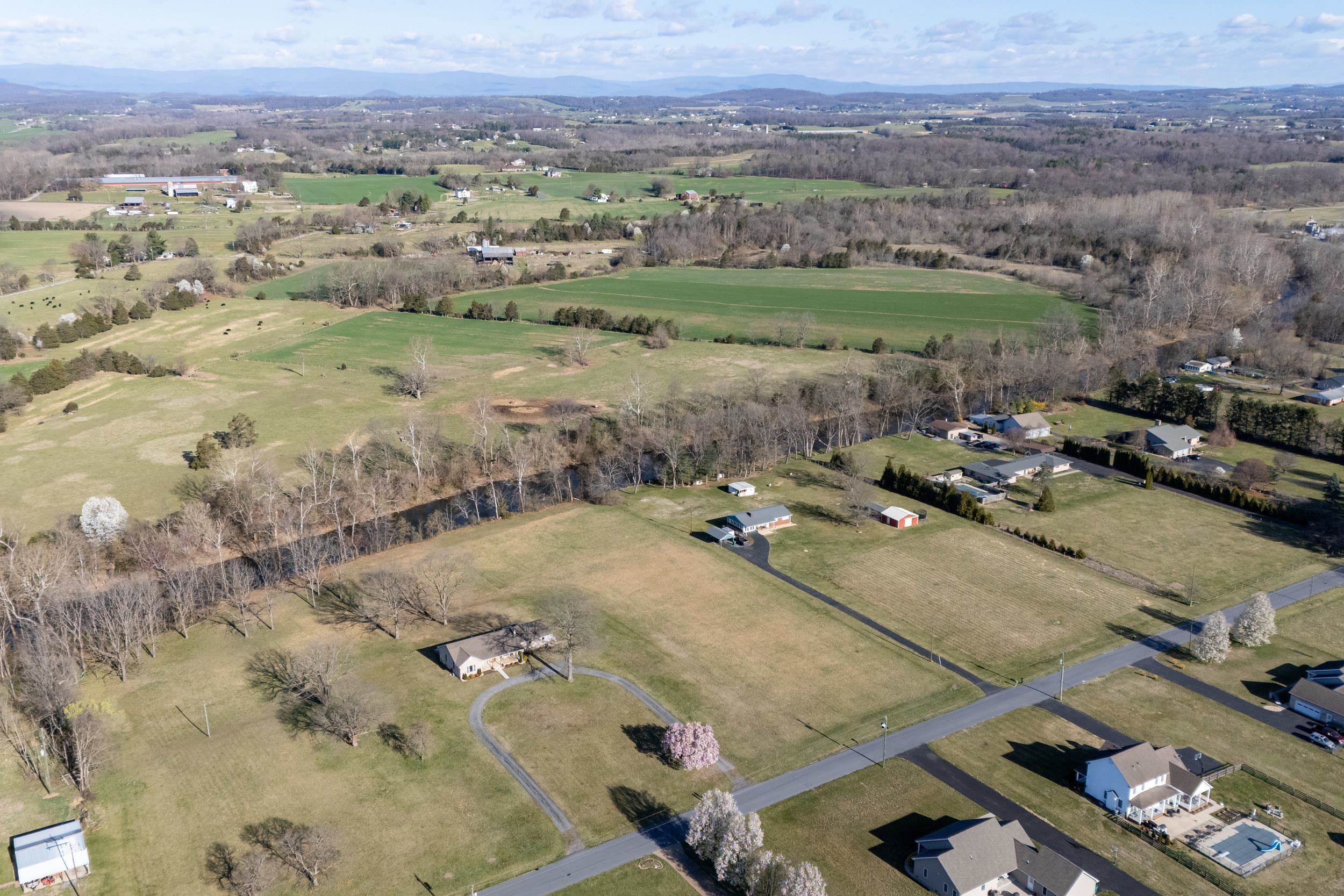 4-5 Riverside Avenue Grottoes, VA 24441 - Photo 17 of 29 an aerial view of a houses with a yard