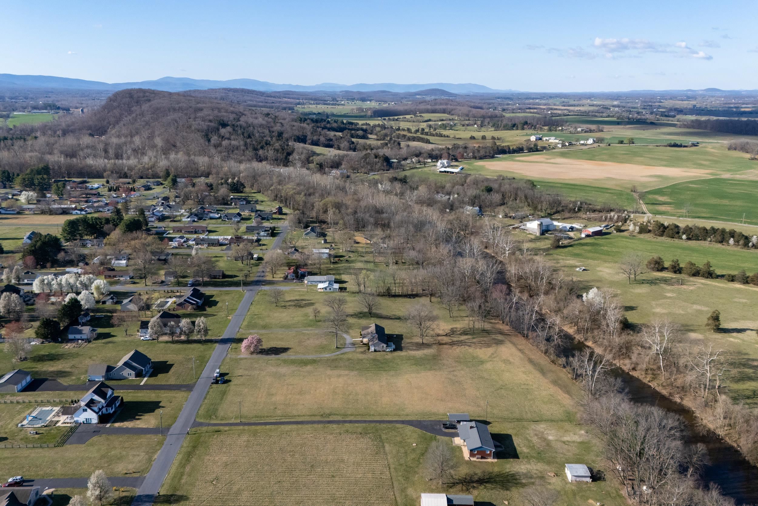4-5 Riverside Avenue Grottoes, VA 24441 - Photo 5 of 29 an aerial view of residential houses with outdoor space