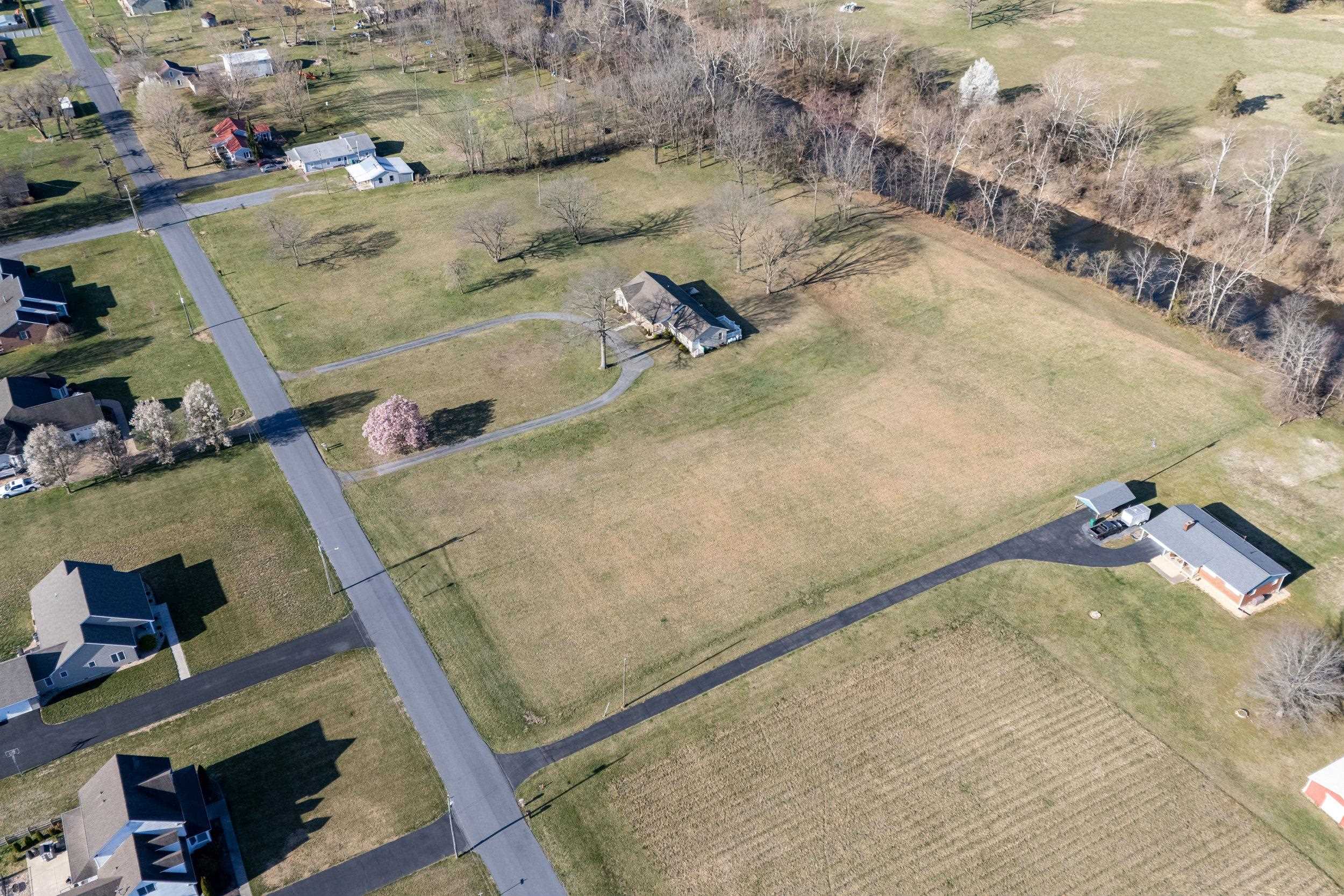 4-5 Riverside Avenue Grottoes, VA 24441 - Photo 8 of 29 an aerial view of residential houses with outdoor space